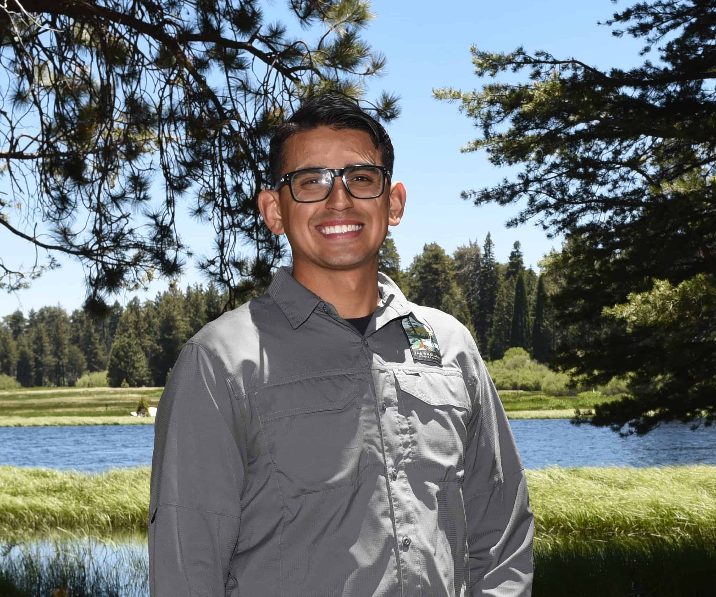 Staff member at The Wildlands Conservancy in outdoor nature setting.