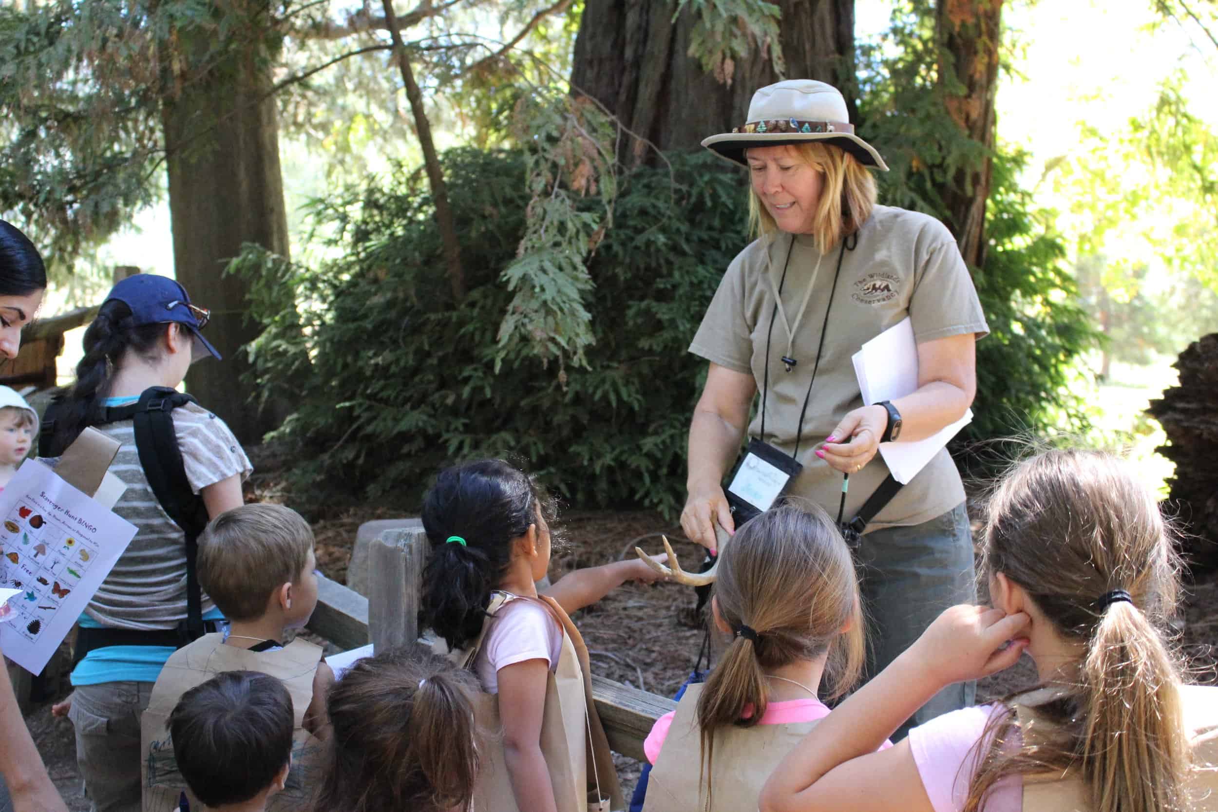   Docent Jane Troy leading a school field trip at Oak Glen Preserve.  