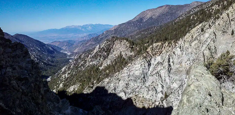 Scenic view of Galena Peak Wilderness Reserve with rugged mountains and clear blue sky.