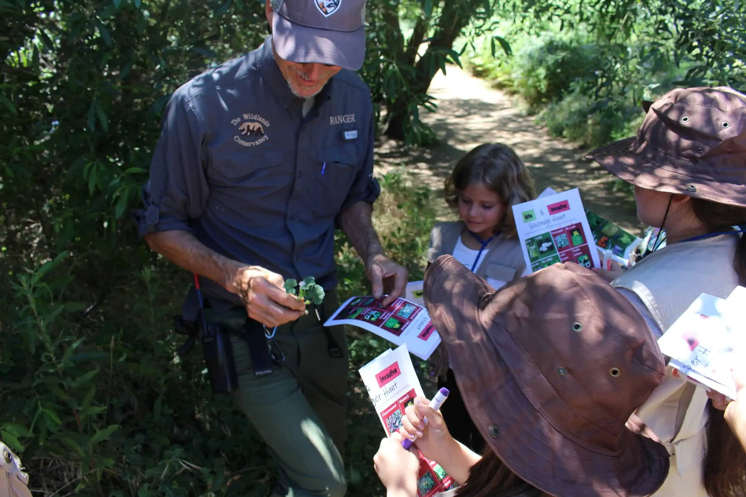  Ranger Charlie teaches the next generation of rangers at Oak Glen Preserve. Photo by Elba Mora. 