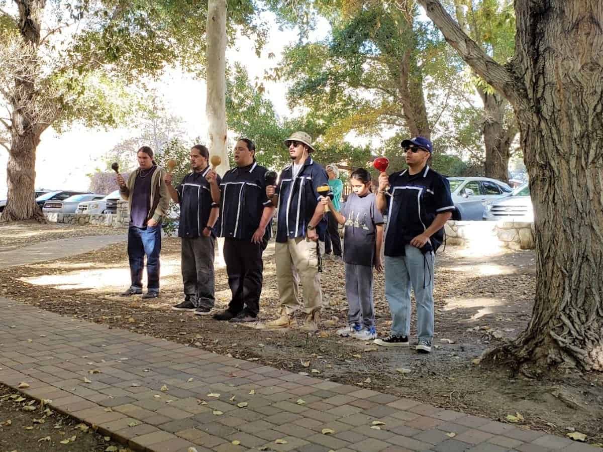 Group of people standing in a park during Native American Heritage Month.