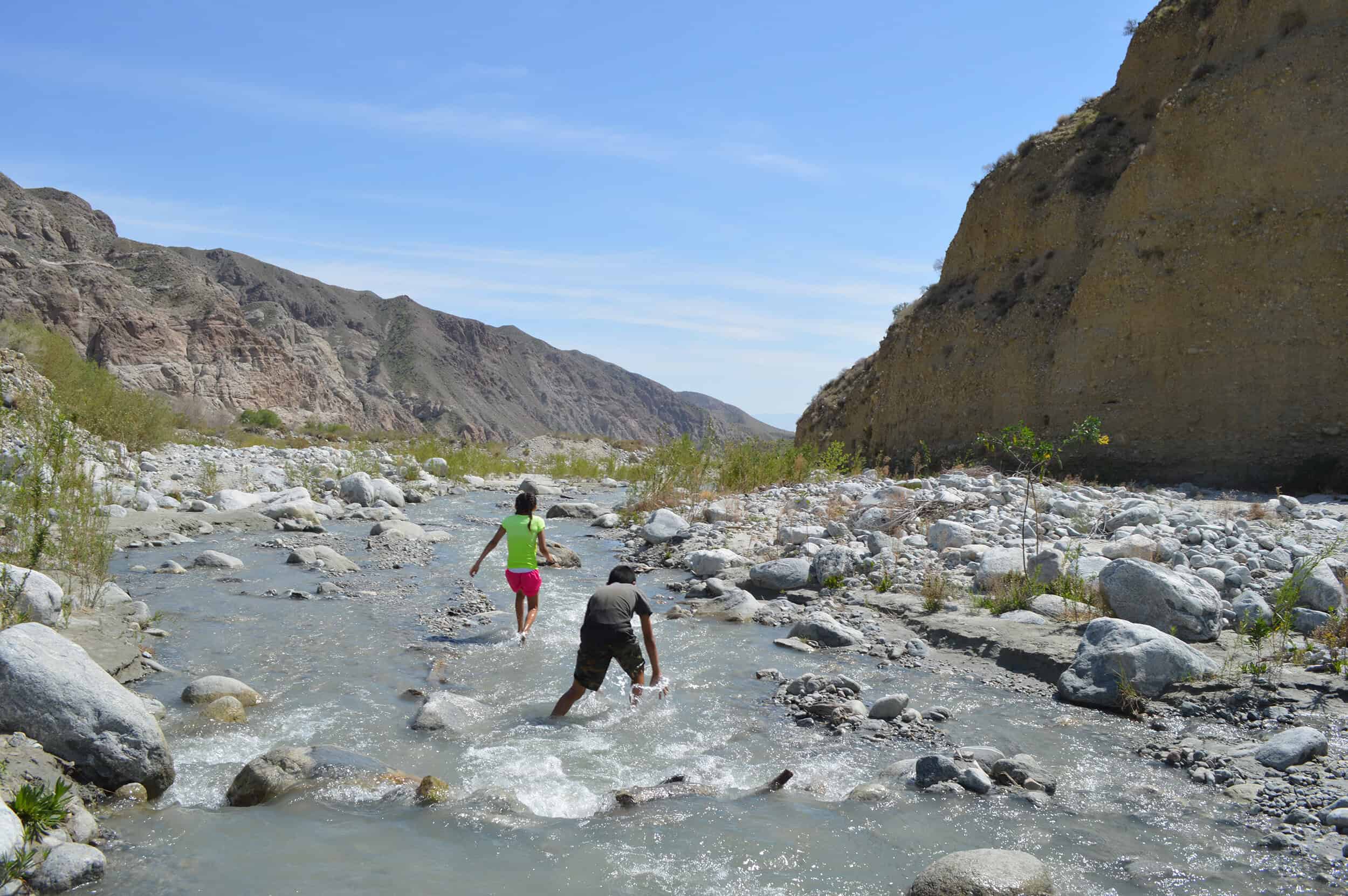   Playing in the cool waters of Whitewater River. Photo by Elba Mora.  